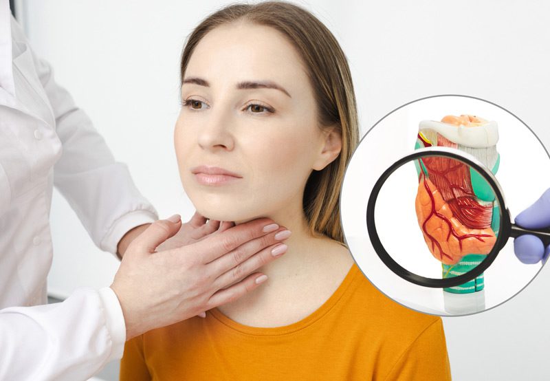 Doctor-palpating-woman’s-neck-to-diagnose-thyroid-disease