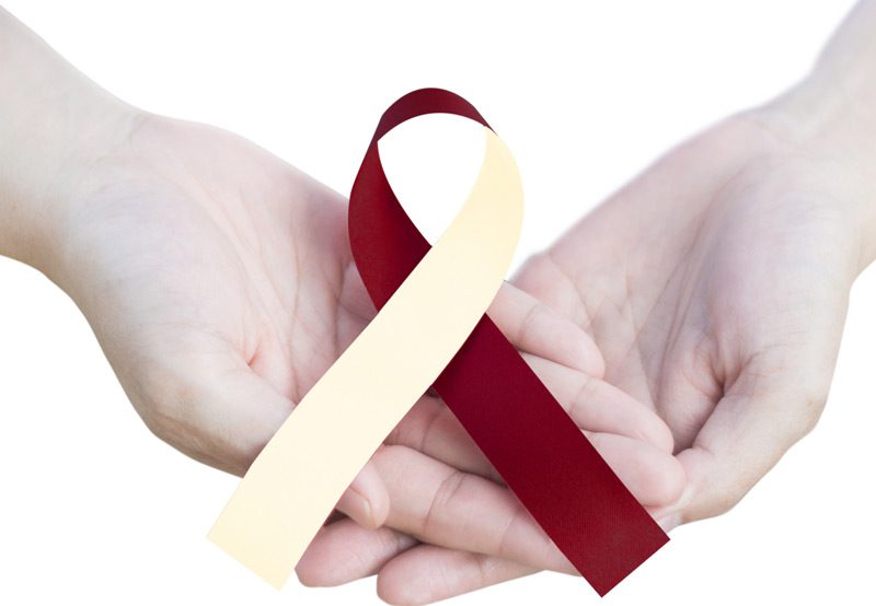 hands-holding-head-and-neck-cancer-awareness-ribbon