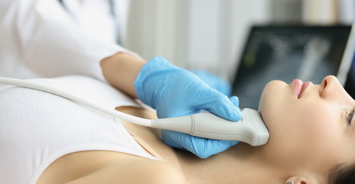 ultrasounad-being-performed-on-thyroid-gland